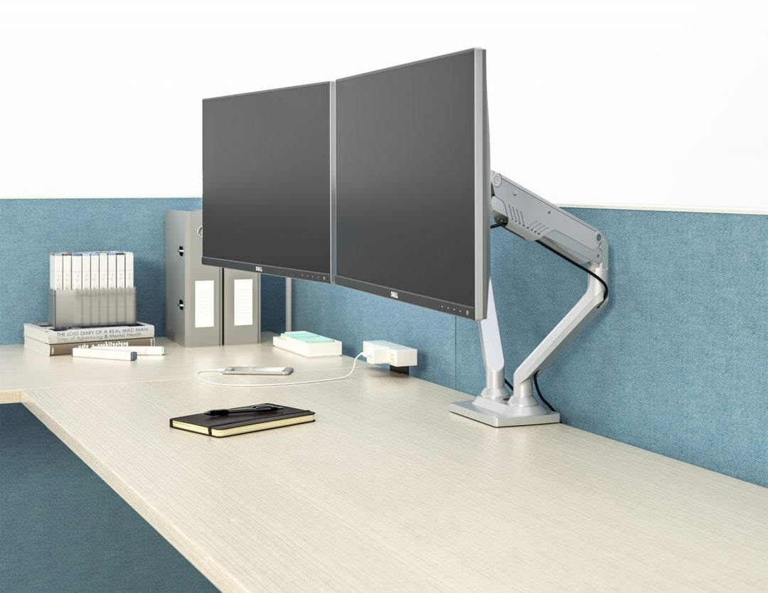 Dual monitor arm and ergonomic accessories
